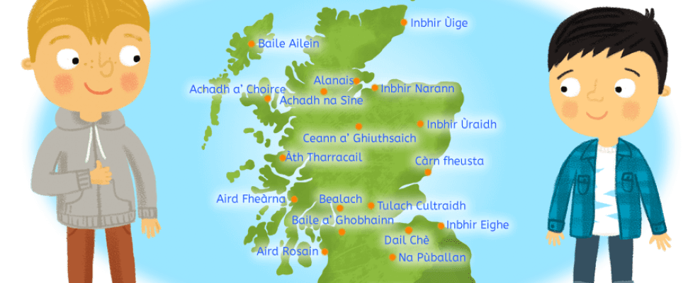 Two boys looking at a map of Scotland with Gaelic names