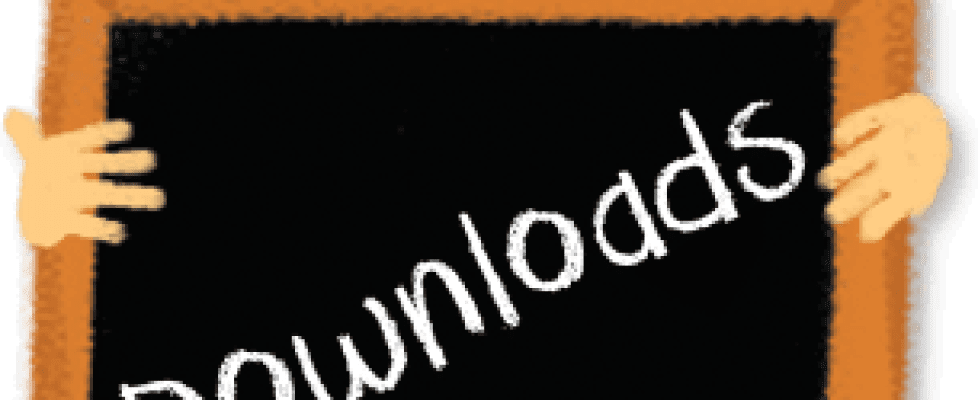 Boy holding chalkboard with "Downloads" written on it