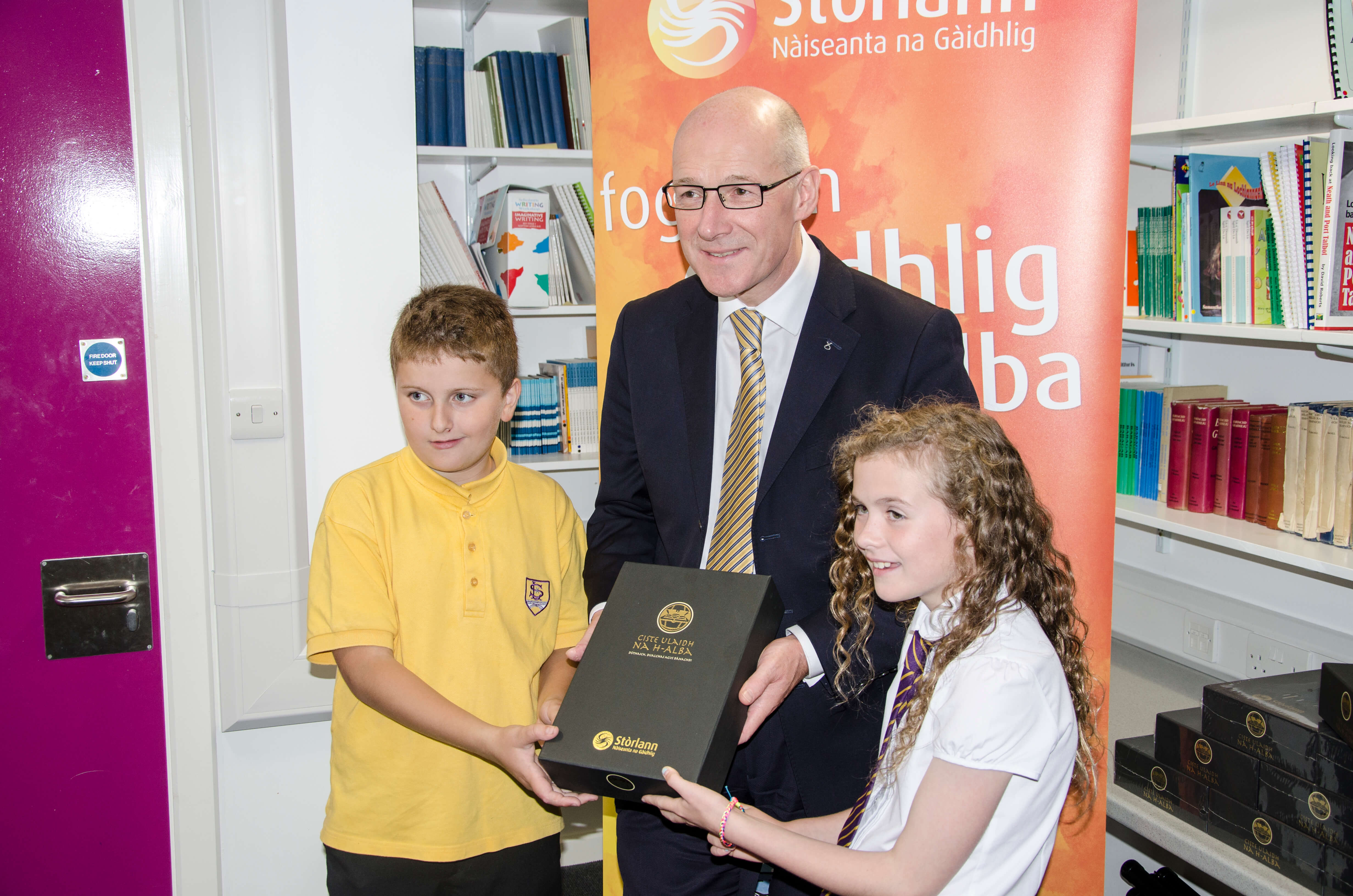 John Swinney pictured during a visit to the Stòrlann offices last year